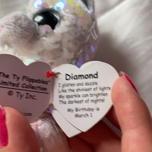 This is a sparkly unicorn toy - Picture 2 of 3